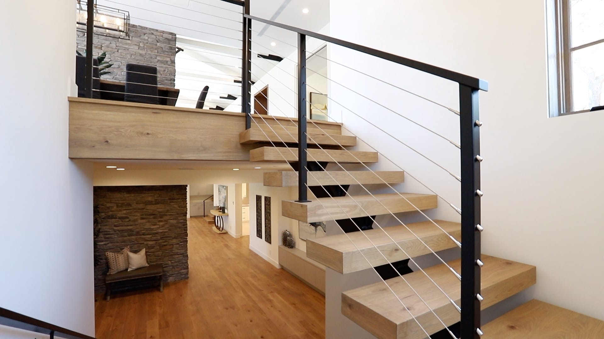 Skylight over wood and steel modern staircase